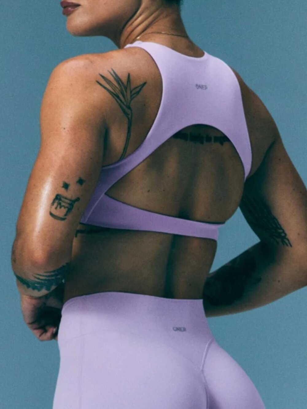 SoftMotion™ High Neck Sports Bra with Gray Logo